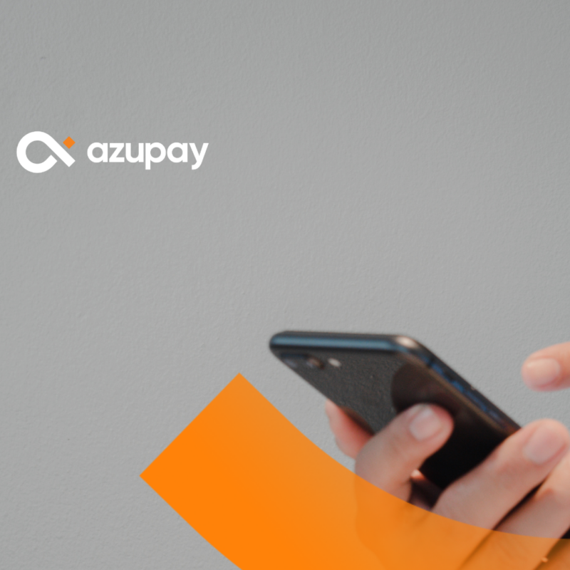 Person using a smartphone alongside the PayID and Azupay logos on a grey background.