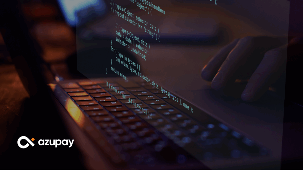 A close-up image of a person typing on a laptop keyboard, with lines of source code digitally overlaid on the screen. The Azupay logo is displayed in the bottom left corner, alongside the title “How We Build Software at Azupay: Fast, Secure and Built to Scale.” The scene is dimly lit, evoking a focused, tech-driven atmosphere.